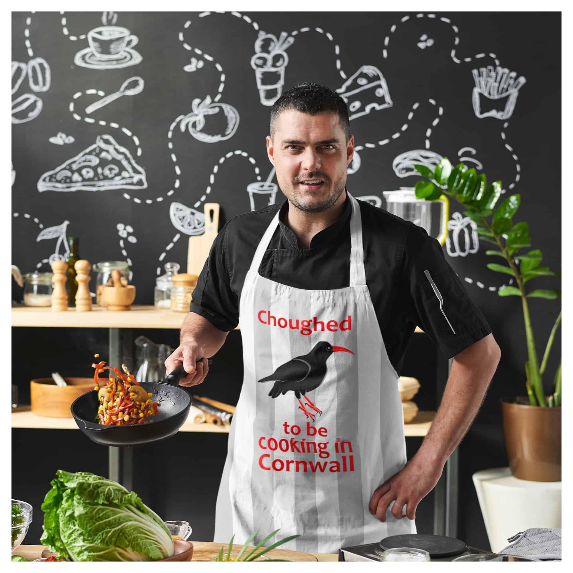 Chough Man Mock Up Man in Cornish apron choughed to be cooking in Cornwall
